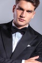 Elegant young business man wearing a tuxedo.