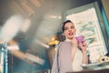 Elegant young lady alone in a cafe Royalty Free Stock Photo