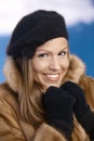 Elegant young woman enjoying winter smiling Royalty Free Stock Photo