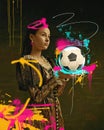 Elegant young woman, medieval royal person standing with football ball on vintage background with abstract doodles