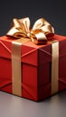 Elegantly adorned: Red gift box, golden ribbon, and exquisite bow.