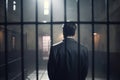 An elegantly dressed businessman in prison AI generated Royalty Free Stock Photo