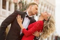 Elegantly dressed couple dancing outside Royalty Free Stock Photo