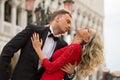 Elegantly dressed couple dancing outside Royalty Free Stock Photo