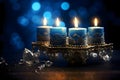 Elegantly located blue candles decorated with gold., banner with space for your own content. Blue background color