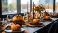 Elegantly set table with small pumpkins candles, smudged background. Pumpkin as a dish of thanksgiving for the harvest Royalty Free Stock Photo