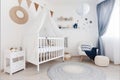 Elegantly Simple, Unisex Minimalist Nursery with a White Crib and Chic DÃÂ©cor. Generative AI