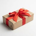 Elegantly wrapped gift box with red ribbon bow Royalty Free Stock Photo