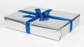 Elegantly wrapped silver gift box with blue ribbon Royalty Free Stock Photo