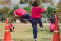 Elemantary students grade 3 take exams high jump.