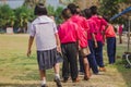 Elemantary students grade 3 take exams high jump.