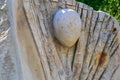 Element of ancient retro vintage abstract monument from block of stone. Symbol of the feminine