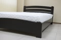 element classic dark wooden bed with hard headboard and mattress