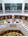 An element of Greek architecture - an antique-style staircase with a statue of Nika of Samothrace. Royalty Free Stock Photo