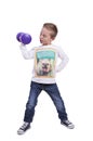 Elementary boy exercising with dumbbell