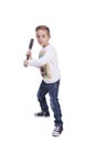 Elementary boy swinging baseball bat Royalty Free Stock Photo