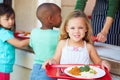 Elementary Pupils Collecting Healthy Lunch In Cafeteria Royalty Free Stock Photo
