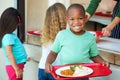 Elementary Pupils Collecting Healthy Lunch In Cafeteria Royalty Free Stock Photo