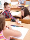 Elementary school boy giving love letter Royalty Free Stock Photo