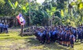 Elementary school children in Haiti gather for morning flag raising.