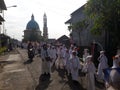 Elementary school children\'s parade in commemoration of the Prophet Muhammad\'s Isra and Miraj