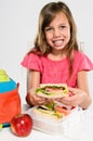 Elementary school girl about to eat her packed lunch Royalty Free Stock Photo