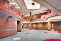 Elementary school hallway with energy efficient ceiling fan for circulation