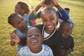 Elementary school kids having fun outdoors, high angle