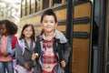 Elementary school kids queueing for the school bus