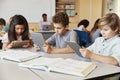 Elementary school kids using tablet computers in class