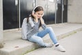 Elementary school pupil outside carrying rucksack Royalty Free Stock Photo