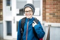 Elementary school pupil outside with rucksack Royalty Free Stock Photo