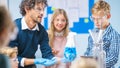 Elementary School Science Classroom: Enthusiastic Teacher Explains Chemistry to Diverse Group of Royalty Free Stock Photo