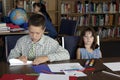 Elementary school students studying Royalty Free Stock Photo