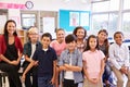 Elementary school teacher and her pupils in classroom Royalty Free Stock Photo