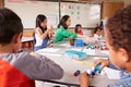 Elementary school teacher uses block play in class with kids