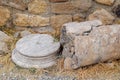 Elements of antique ruins of limestone blocks. The destroyed columns. Ruins of city of Hierapolis Royalty Free Stock Photo