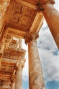 Elements of the columns of the architectural structure against the blue sky of the Library of Celsus in Ephesus, Turkey Royalty Free Stock Photo