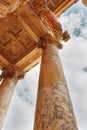 Elements of the columns of the architectural structure against the blue sky of the Library of Celsus in Ephesus, Turkey Royalty Free Stock Photo