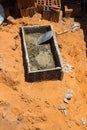 Elements for construction. Cement box and mason bucket. Eight hole ceramic bricks. Work under construction Royalty Free Stock Photo