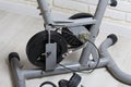 Elements of an exercise bike. Servicing the drive pulley and flywheel. Close-up