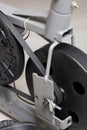 Elements of an exercise bike. Servicing the drive pulley and flywheel. Close-up