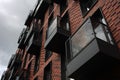 Exterior of a high-rise apartment building facade, windows and balconies. Royalty Free Stock Photo