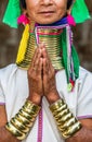 Elements of traditional female jewelry of the Padaung people rings on the neck and bracelets on the hands.