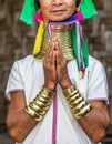 Elements of traditional female jewelry of the Padaung people rings on the neck and bracelets on the hands.