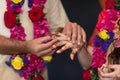 Elements of Vedic wedding wearing rings close up Royalty Free Stock Photo