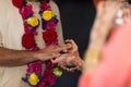 Elements of Vedic wedding wearing rings close up