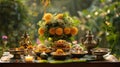 Elements of the Vishu festival, including a traditional brass lamp (Nilavilakku) and a mirror, set against a Royalty Free Stock Photo