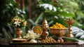 Elements of the Vishu festival, including a traditional brass lamp (Nilavilakku) and a mirror, set against a Royalty Free Stock Photo