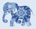 Elephant. Silhouette filled by ornament in blue colors. African decorative pattern.